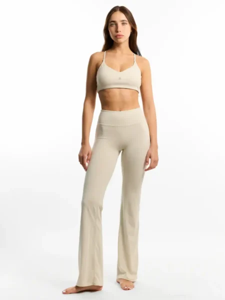 beige sports bra flared yoga pants